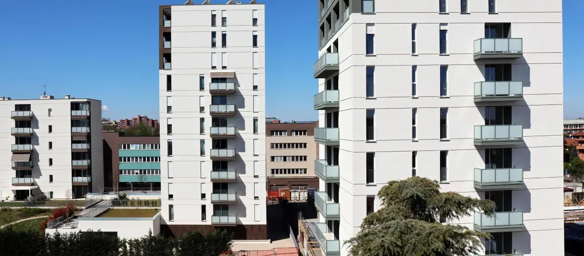 Future apartment building site with blueprint and valuation documents